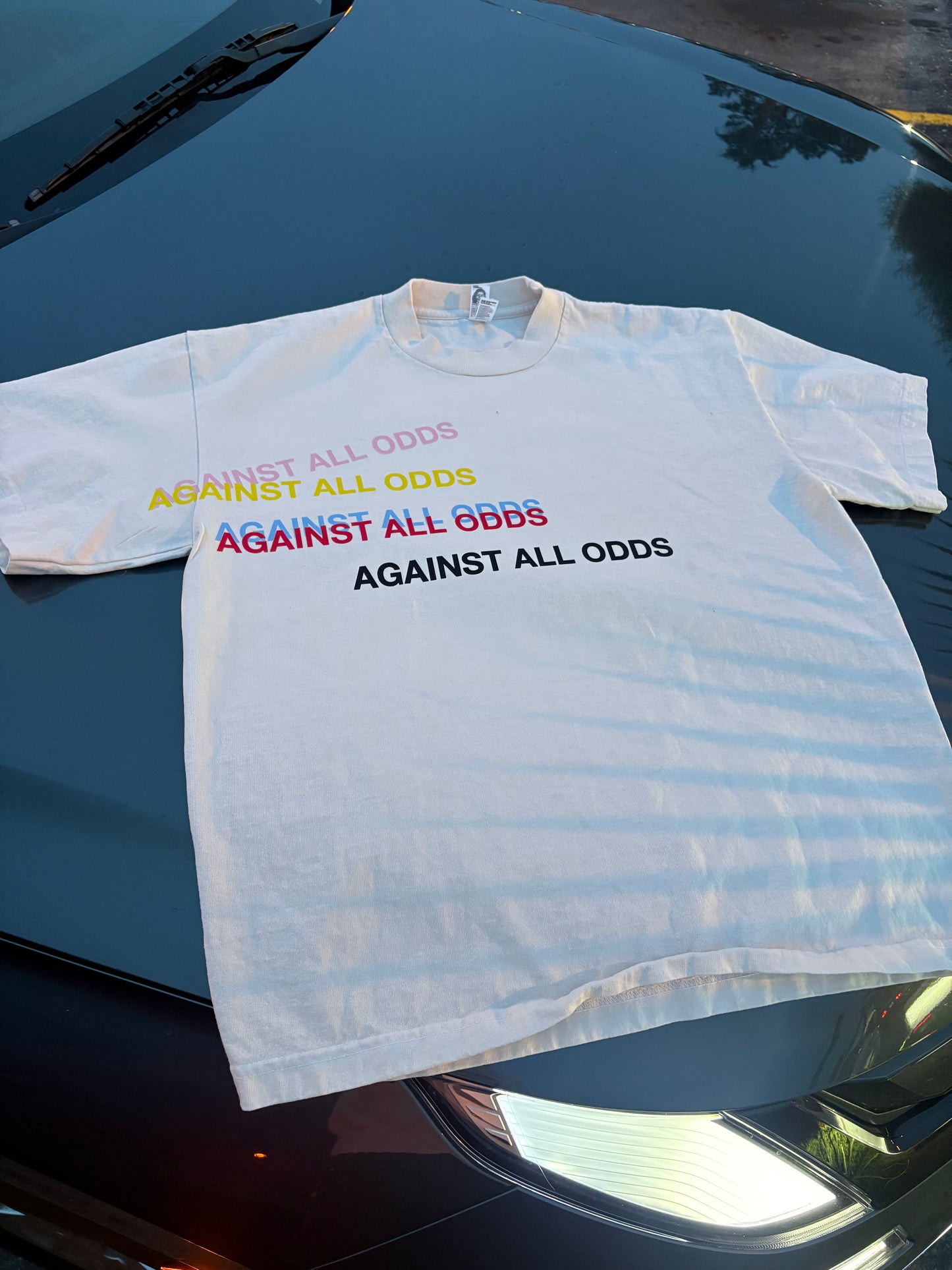 Against All Odds Tee